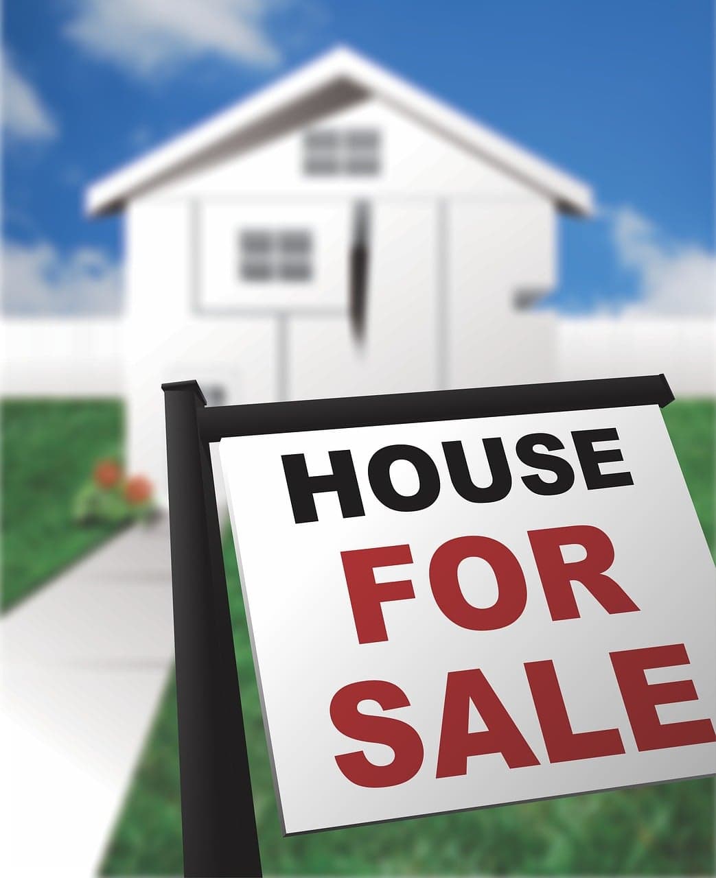 House for sale sign in front of a home